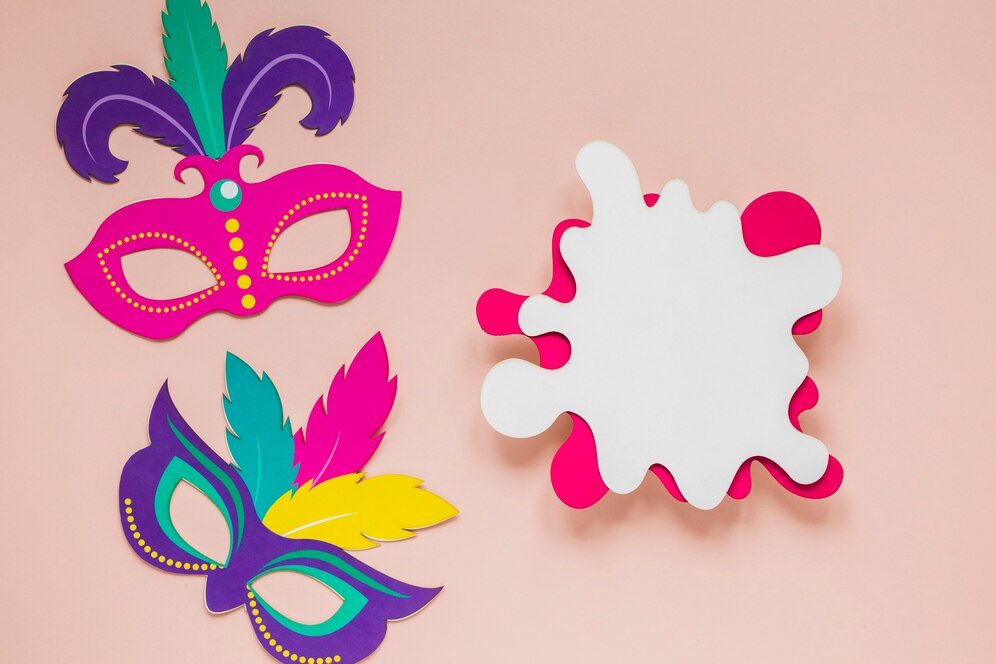 Colorful carnival masks in pink and blue with feathers